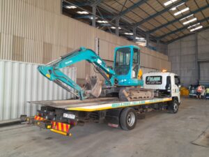 folami flatbed truck moving construction vehicle